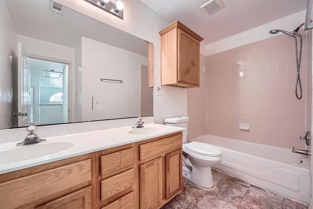4712 Ramies Run, Austin, TX 78749 - bathroom featuring double vanity and shower / bathtub combination