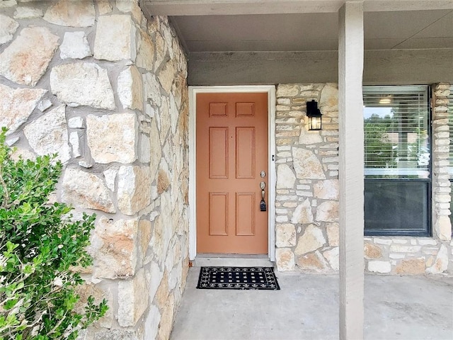 9512 Meadowheath Dr, Austin, TX 78729 - view of exterior entry with stone siding