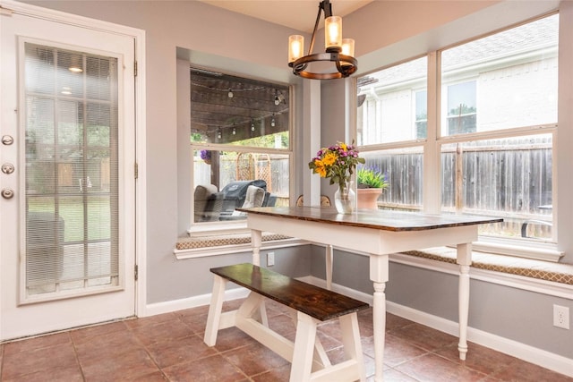1006 Savanna Ln, Cedar Park, TX 78613 - dining room with a chandelier, baseboards, and tile patterned flooring
