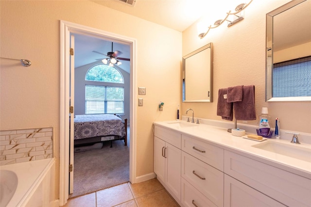 1006 Savanna Ln, Cedar Park, TX 78613 - full bath featuring double vanity, tile patterned flooring, connected bathroom, a garden tub, and a ceiling fan