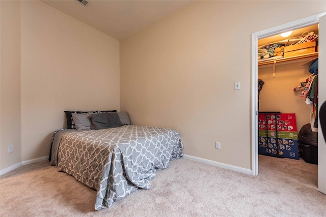 1006 Savanna Ln, Cedar Park, TX 78613 - bedroom featuring a spacious closet, carpet, vaulted ceiling, baseboards, and a closet