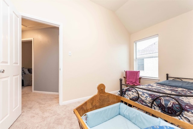1006 Savanna Ln, Cedar Park, TX 78613 - bedroom featuring light colored carpet, vaulted ceiling, and baseboards