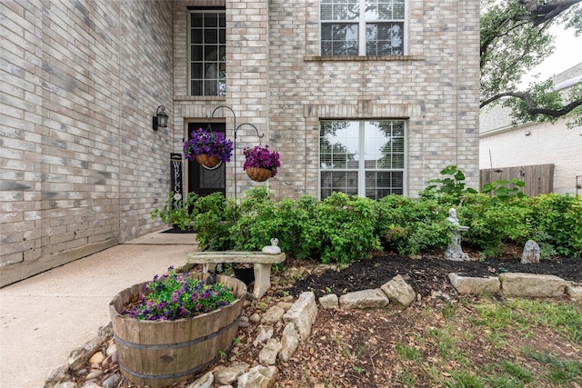 1006 Savanna Ln, Cedar Park, TX 78613 - view of exterior entry featuring brick siding