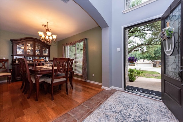 1006 Savanna Ln, Cedar Park, TX 78613 - foyer featuring arched walkways, a chandelier, and baseboards