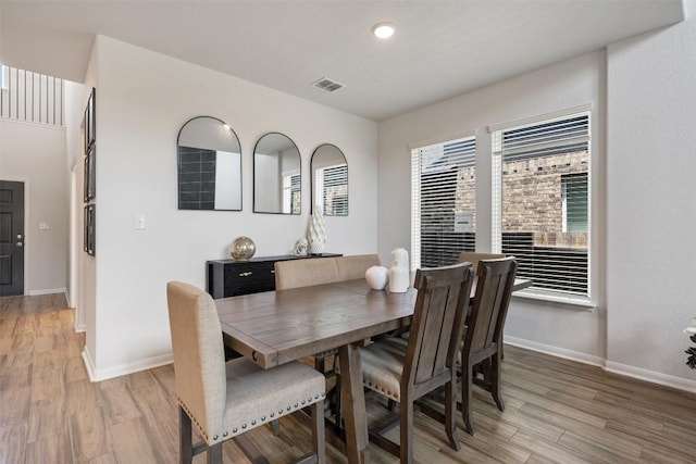 707 Sugar Cane Rd, Buda, TX 78610 - dining space with light wood finished floors, baseboards, and recessed lighting