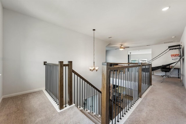 707 Sugar Cane Rd, Buda, TX 78610 - hallway with carpet floors, a chandelier, an upstairs landing, and baseboards