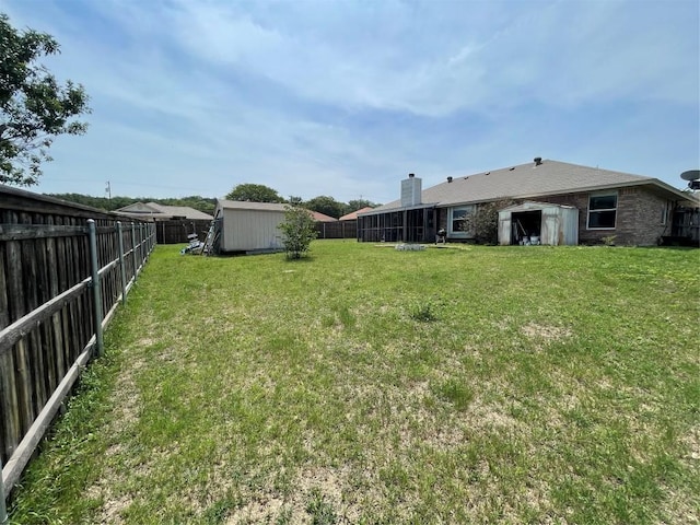 907 Vernon Dr, Copperas Cove, TX 76522 - fenced backyard featuring a storage shed