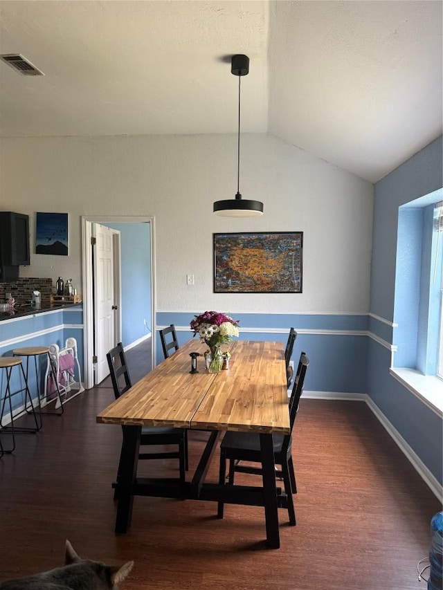 907 Vernon Dr, Copperas Cove, TX 76522 - dining space with dark wood-type flooring and lofted ceiling