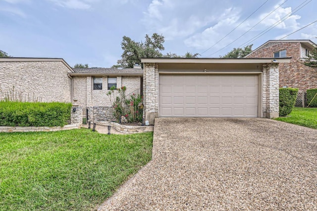 9518 Topridge Dr Unit 7, Austin, TX 78750 - view of front of house featuring stone siding, concrete driveway, an attached garage, and a front lawn