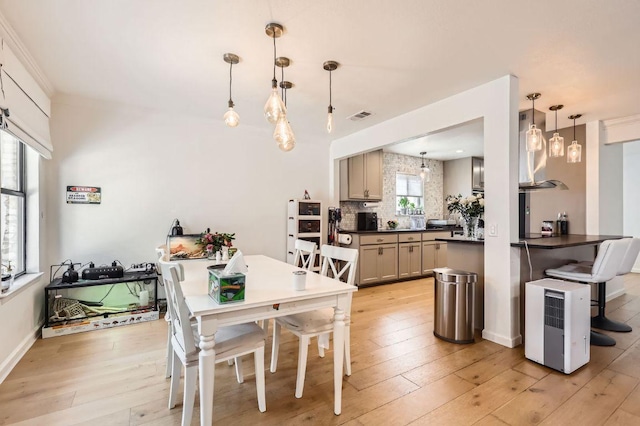 9518 Topridge Dr Unit 7, Austin, TX 78750 - dining room featuring light wood finished floors
