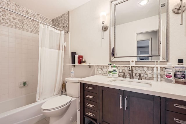 9518 Topridge Dr Unit 7, Austin, TX 78750 - bathroom featuring vanity, decorative backsplash, and shower / bath combo
