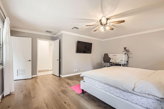 9518 Topridge Dr Unit 7, Austin, TX 78750 - bedroom featuring wood finished floors, ornamental molding, and ceiling fan