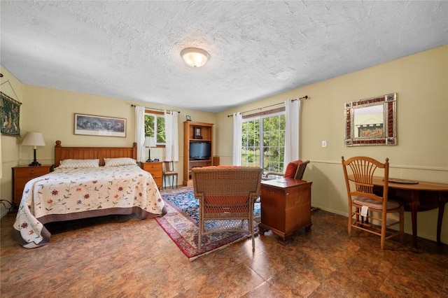 10908 Slaughter Creek Dr, Austin, TX 78748 - bedroom featuring a textured ceiling