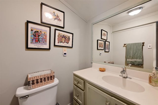 10908 Slaughter Creek Dr, Austin, TX 78748 - half bath featuring vanity, toilet, and crown molding