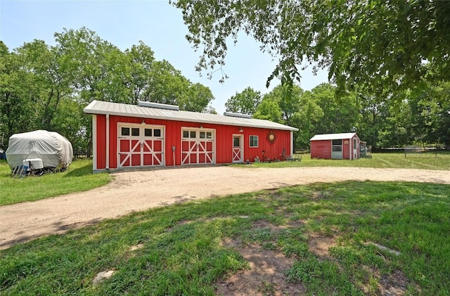 10908 Slaughter Creek Dr, Austin, TX 78748 - view of outbuilding with driveway