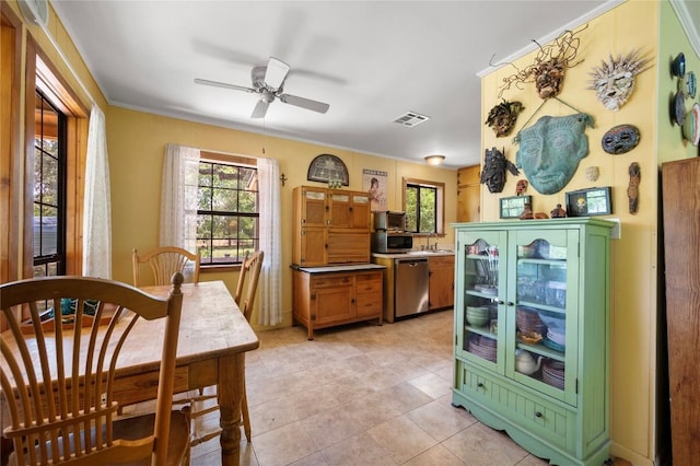 10908 Slaughter Creek Dr, Austin, TX 78748 - dining area with ceiling fan and light tile patterned floors