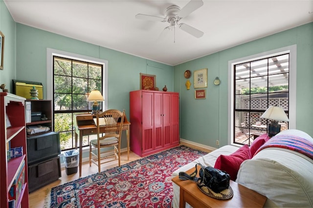 10908 Slaughter Creek Dr, Austin, TX 78748 - home office featuring a ceiling fan and light wood-style flooring