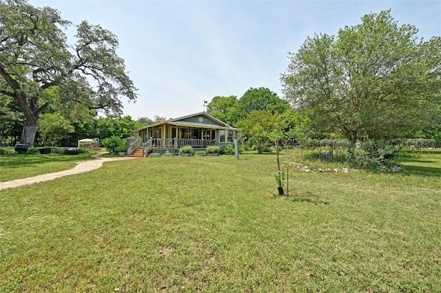 10908 Slaughter Creek Dr, Austin, TX 78748 - view of green lawn with a porch