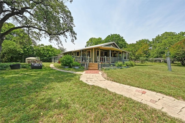 10908 Slaughter Creek Dr, Austin, TX 78748 - view of front of home with a porch and a front lawn