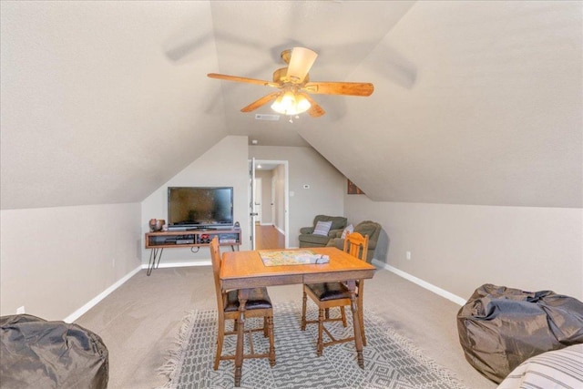 1409 Old Mill Rd, Salado, TX 76571 - dining room featuring carpet floors, baseboards, lofted ceiling, and a ceiling fan