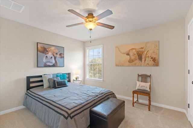1409 Old Mill Rd, Salado, TX 76571 - bedroom with carpet floors, baseboards, and ceiling fan