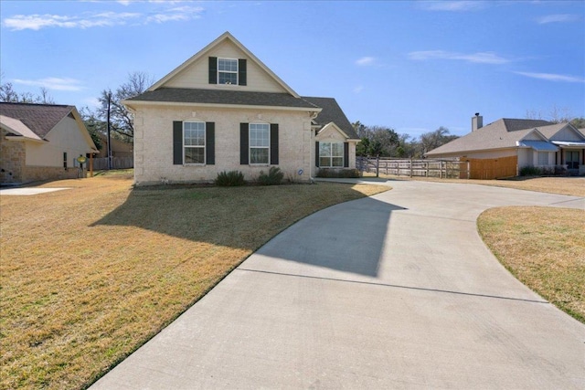 1409 Old Mill Rd, Salado, TX 76571 - traditional-style house featuring curved driveway