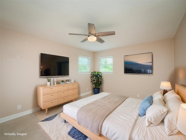 2702 Double Tree St, Round Rock, TX 78681 - bedroom with baseboards, light colored carpet, and ceiling fan