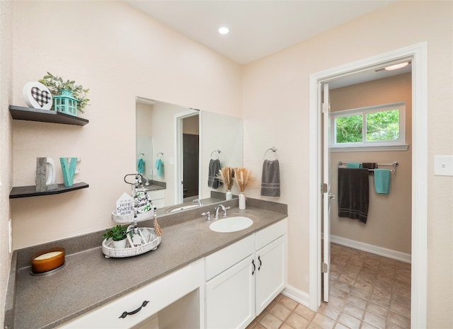2702 Double Tree St, Round Rock, TX 78681 - bathroom with vanity and baseboards
