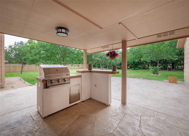 2702 Double Tree St, Round Rock, TX 78681 - view of patio featuring an outdoor kitchen and grilling area