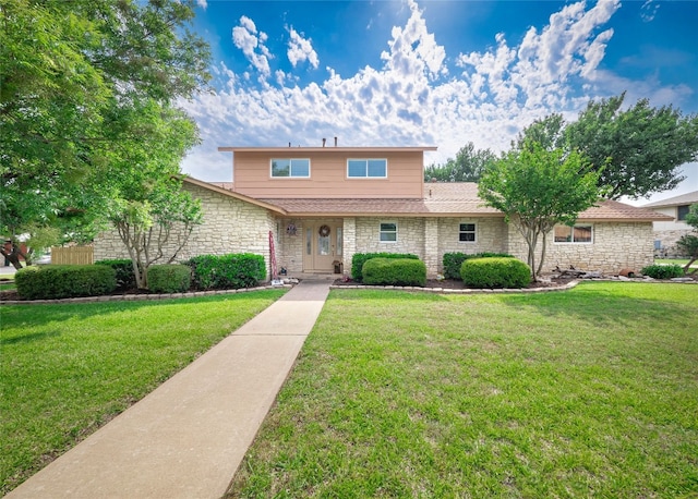 2702 Double Tree St, Round Rock, TX 78681 - traditional home with stone siding and a front yard