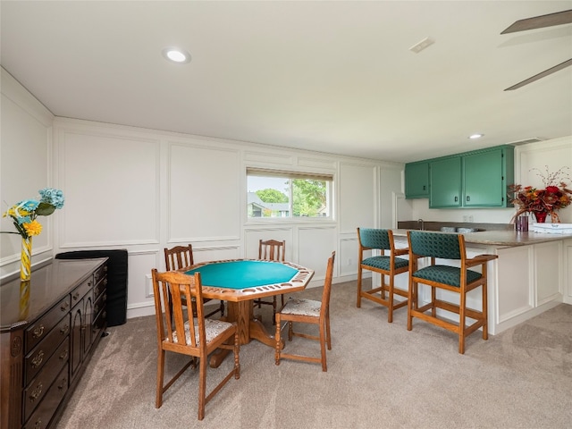 2702 Double Tree St, Round Rock, TX 78681 - dining space featuring a decorative wall, light carpet, ceiling fan, and recessed lighting