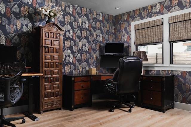 713 E 32nd St, Austin, TX 78705 - home office featuring wallpapered walls, light wood-type flooring, and recessed lighting