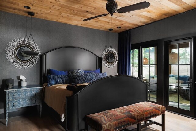 713 E 32nd St, Austin, TX 78705 - bedroom featuring wood ceiling, wood finished floors, access to exterior, a textured wall, and ceiling fan