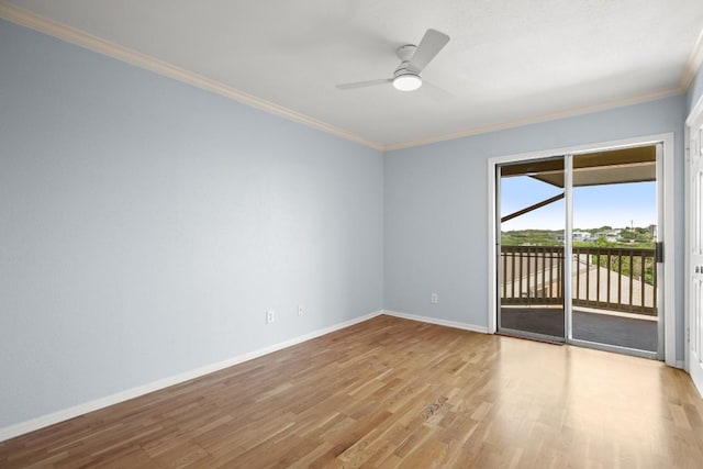 2450 Wickersham Ln Unit M1318, Austin, TX 78741 - empty room with ornamental molding, wood finished floors, baseboards, and a ceiling fan