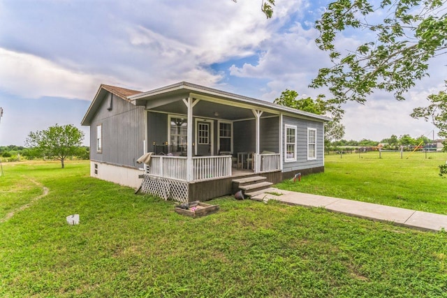 116 Hokanson Rd, Del Valle, TX 78617 - view of front of home featuring a front yard and a porch