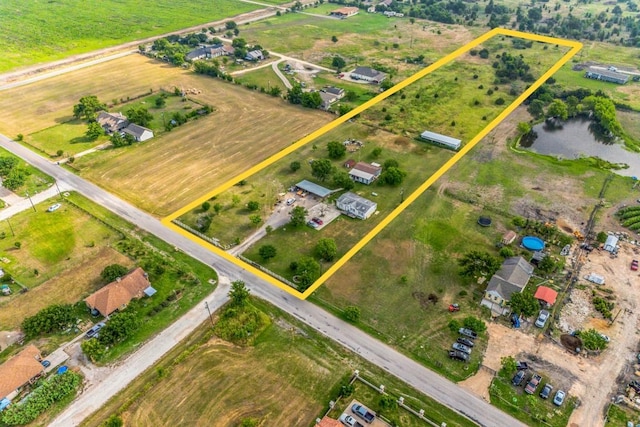 116 Hokanson Rd, Del Valle, TX 78617 - aerial overview of property's location featuring property parcel outlined and a nearby body of water