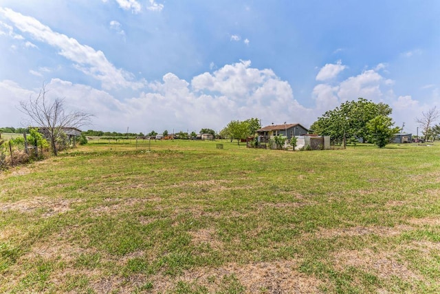 116 Hokanson Rd, Del Valle, TX 78617 - view of green lawn featuring a rural view