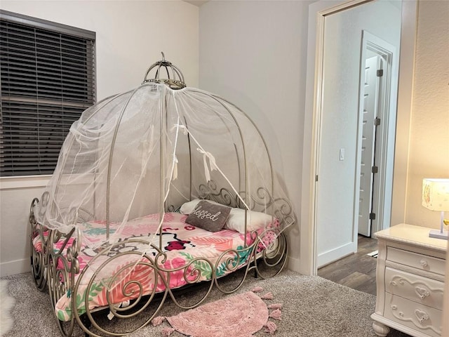 1162 Thicket Ln, New Braunfels, TX 78132 - bedroom with baseboards and wood finished floors