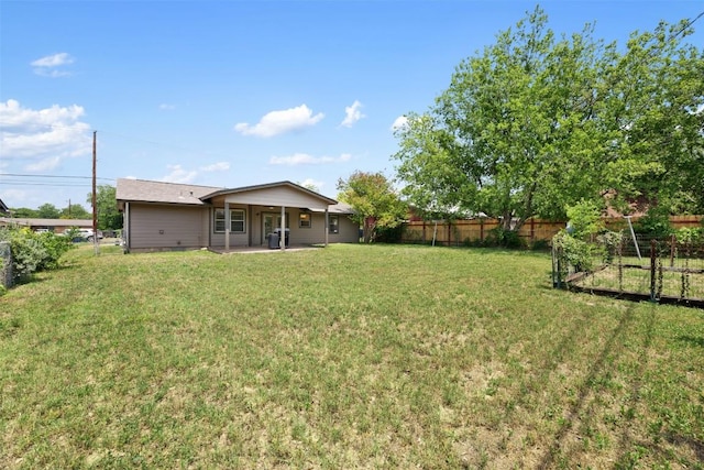 105 E St Johns Ave, Austin, TX 78752 - view of yard featuring a patio