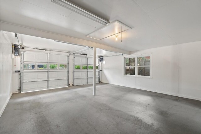 1254 S Church St, Georgetown, TX 78626 - garage featuring baseboards