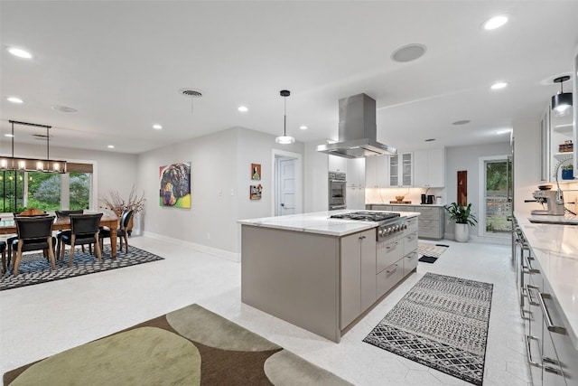1254 S Church St, Georgetown, TX 78626 - kitchen with island exhaust hood, stainless steel appliances, white cabinetry, a center island, and recessed lighting