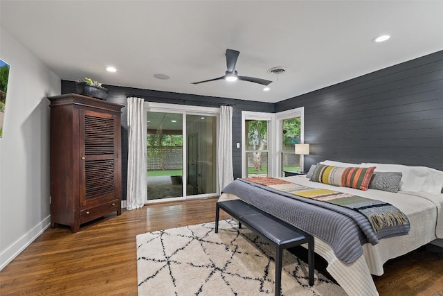 1254 S Church St, Georgetown, TX 78626 - bedroom with access to exterior, wood finished floors, baseboards, recessed lighting, and a ceiling fan