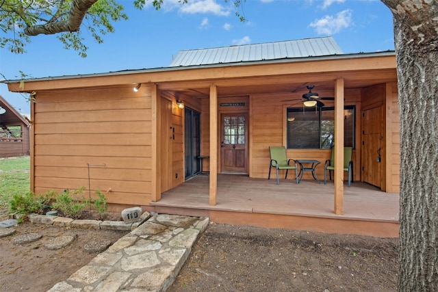 119 Topspin Cir, Spicewood, TX 78669 - property entrance featuring a ceiling fan, metal roof, and covered porch
