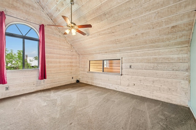 119 Topspin Cir, Spicewood, TX 78669 - carpeted spare room featuring vaulted ceiling, wooden ceiling, wood walls, and a ceiling fan