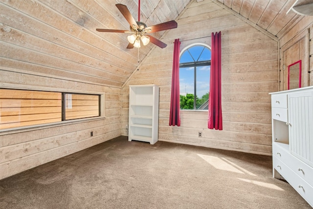 119 Topspin Cir, Spicewood, TX 78669 - carpeted spare room featuring vaulted ceiling, wooden ceiling, wooden walls, and a ceiling fan