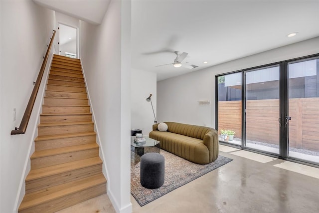 3409 Neal St Unit 2, Austin, TX 78702 - stairway featuring concrete flooring, ceiling fan, and recessed lighting