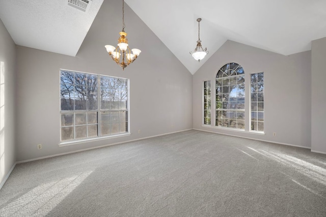 16901 Dashwood Creek Dr, Pflugerville, TX 78660 - spare room featuring a chandelier, carpet floors, and high vaulted ceiling