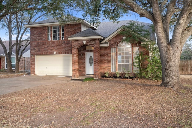 16901 Dashwood Creek Dr, Pflugerville, TX 78660 - traditional home featuring an attached garage, brick siding, driveway, and a shingled roof