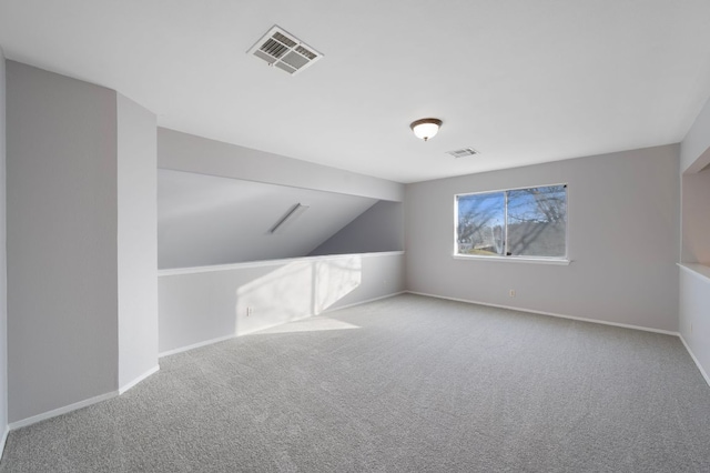 16901 Dashwood Creek Dr, Pflugerville, TX 78660 - additional living space with carpet, baseboards, and lofted ceiling