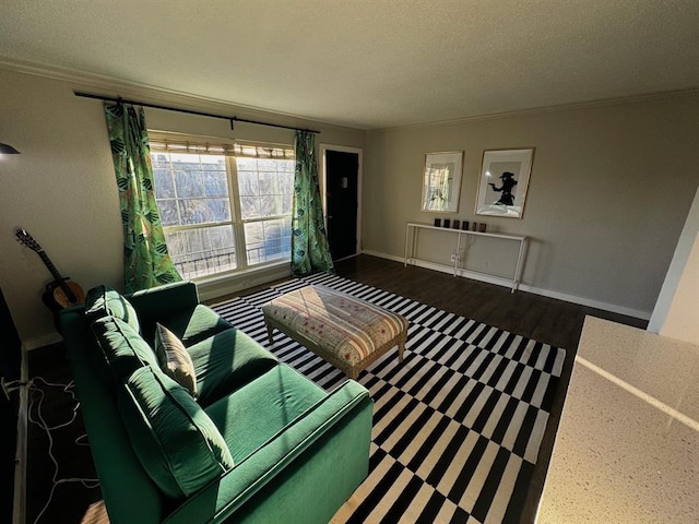2425 Ashdale Dr Unit 101, Austin, TX 78757 - living area featuring crown molding, baseboards, a textured ceiling, and wood finished floors